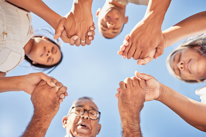 Worship, prayer and family holding hands praying together for spiritual help, higher power support .