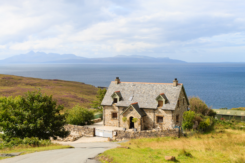 Rural panorama from Scotland. House  from Highlands region. Travel destinations