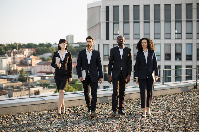 a team of business people dressed formally