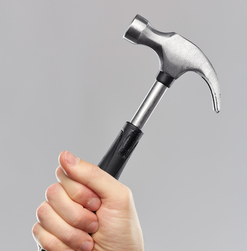 hand holding hammer