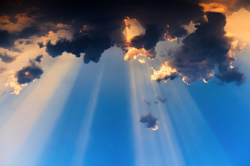 sunlight streaming through the clouds
